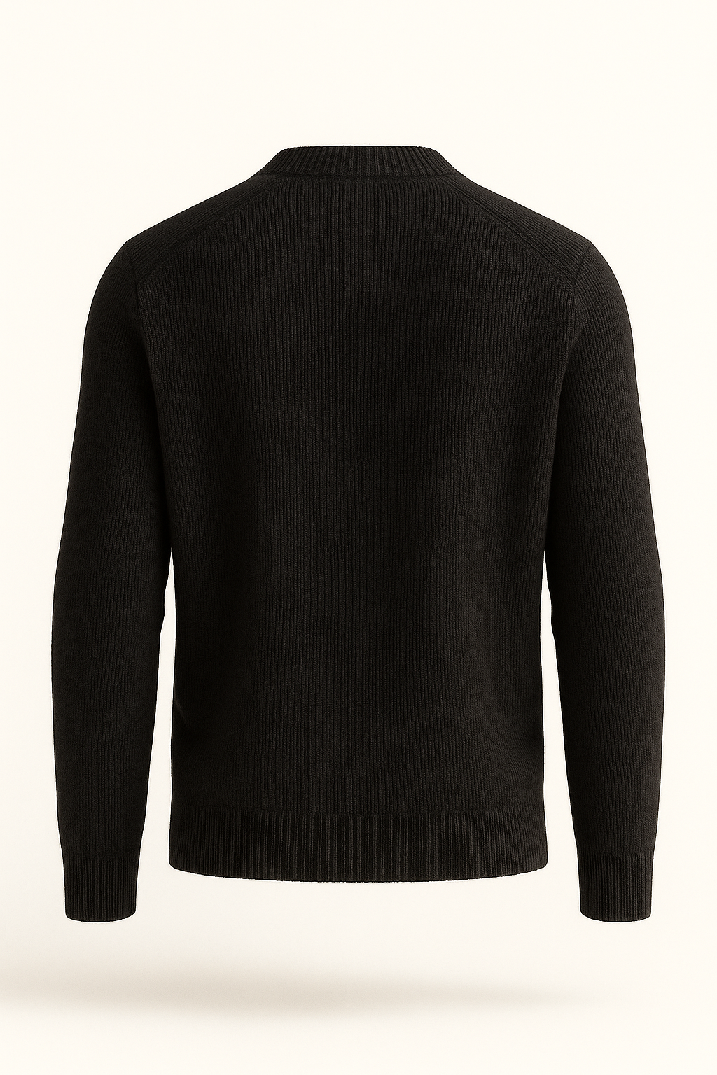 Black cashmere knit sweater by Emiral Couture, featuring a classic design and soft texture, perfect for layering.