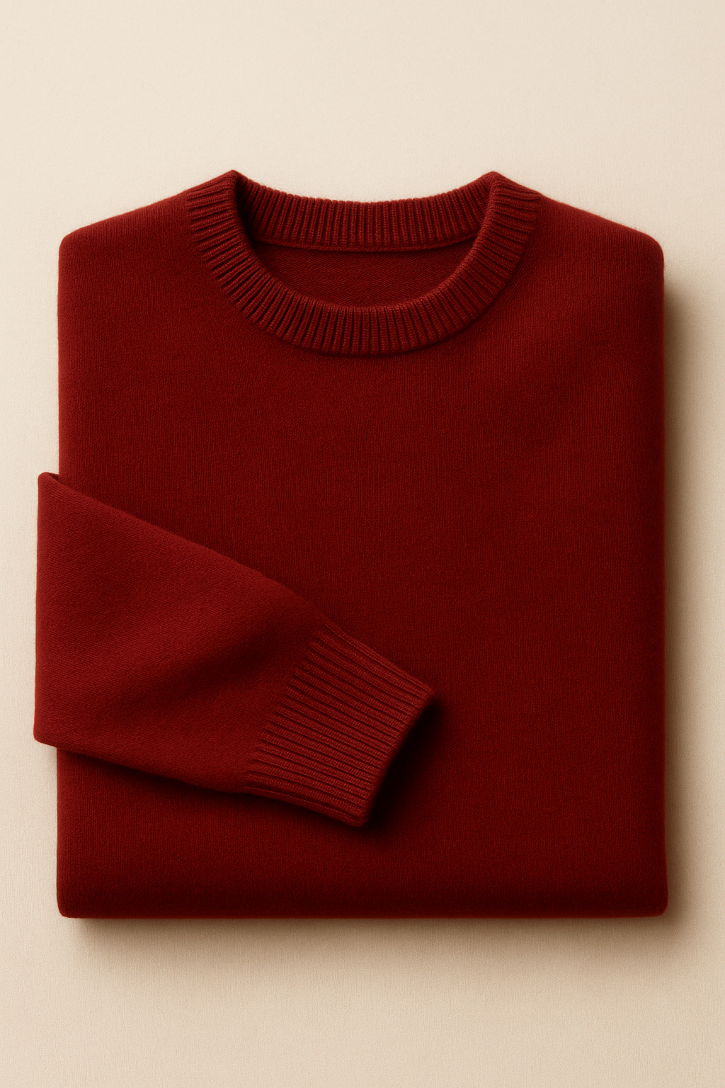 Emiral Couture burgundy cashmere knit sweater displayed on a mannequin, showcasing its soft texture and elegant design.