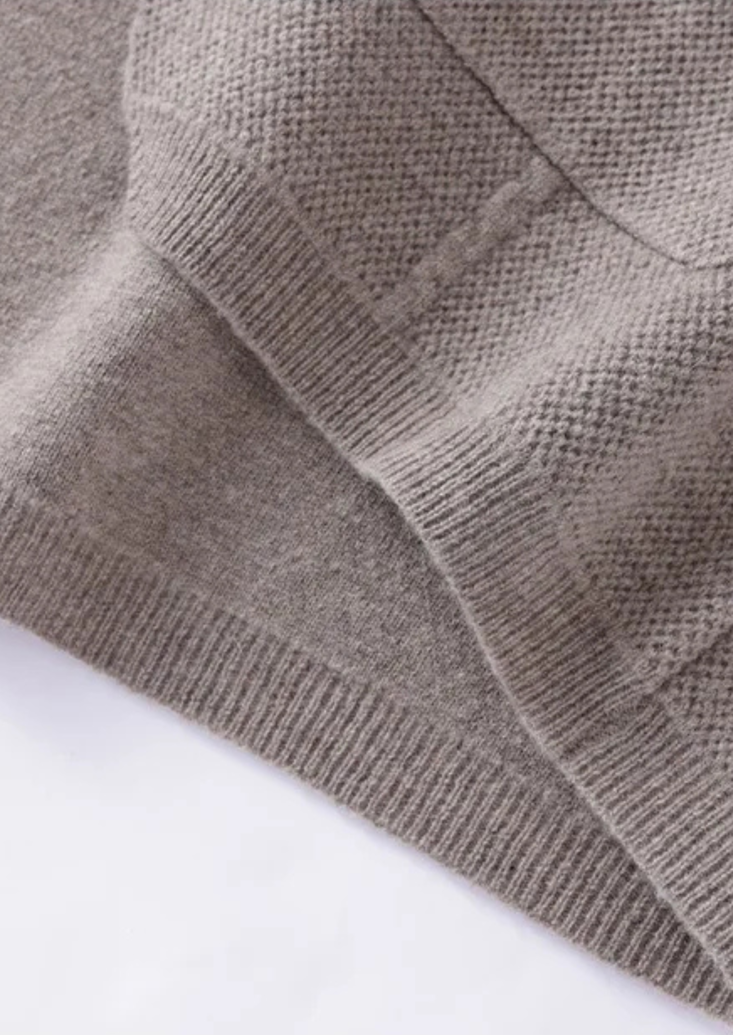 Gray Valero cashmere cardigan by Emiral Couture, featuring a soft texture and classic open-front design.