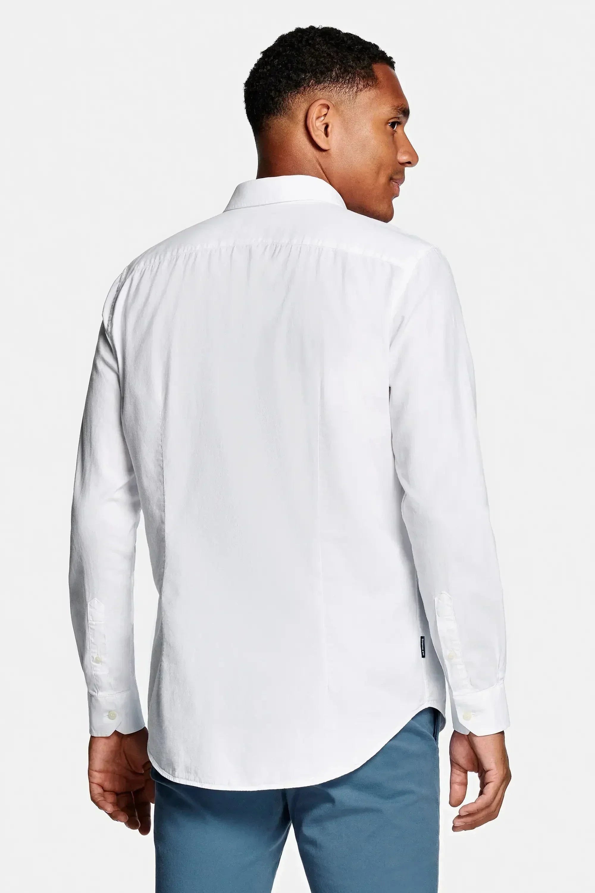 White Firenze cotton shirt by Emiral Couture, featuring a classic collar and long sleeves, perfect for casual or formal wear.