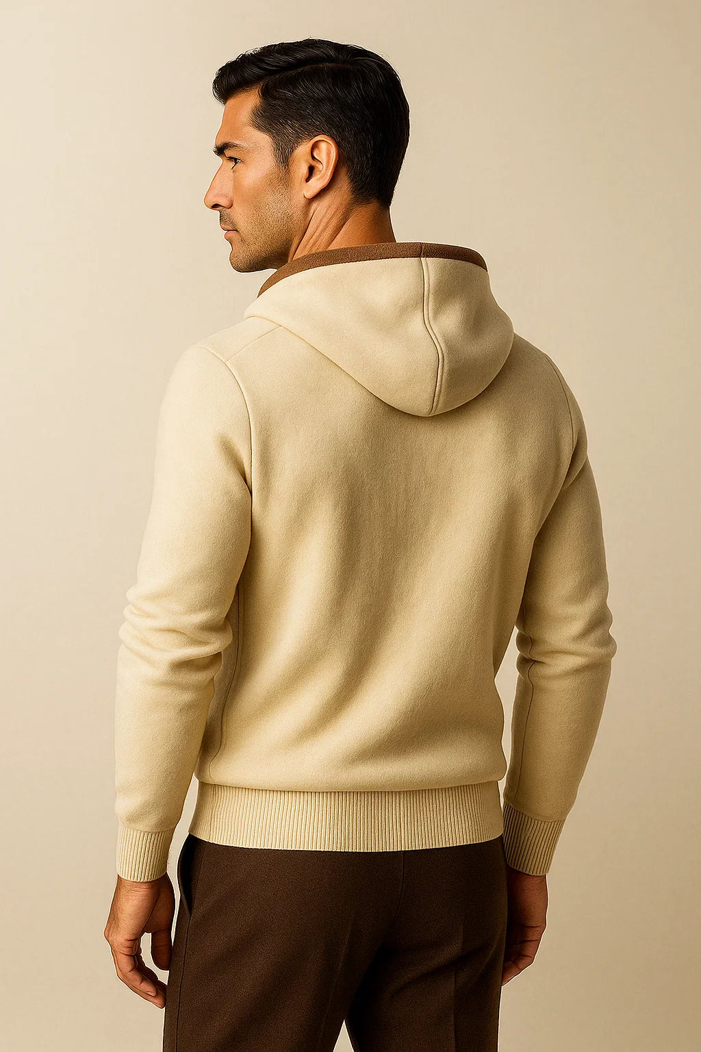 Cream hooded cardigan by Emiral Couture, featuring a relaxed fit and cozy texture, perfect for layering in cool weather.