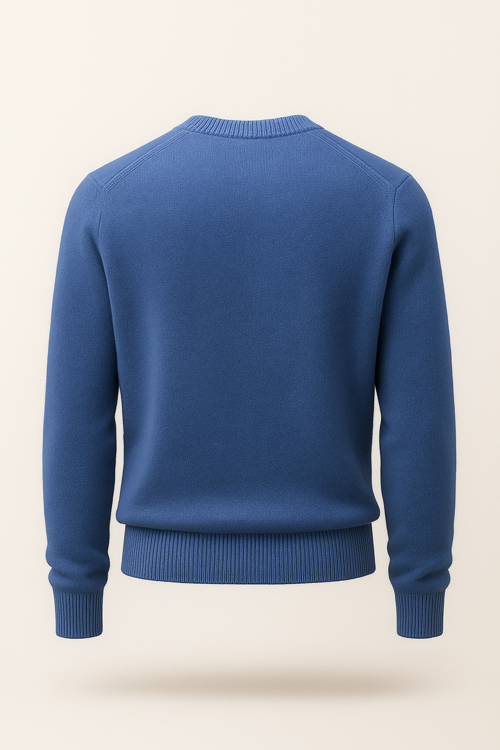 Blue cashmere sweater by Emiral Couture, featuring a cozy knit design and a relaxed fit, perfect for layering in style.