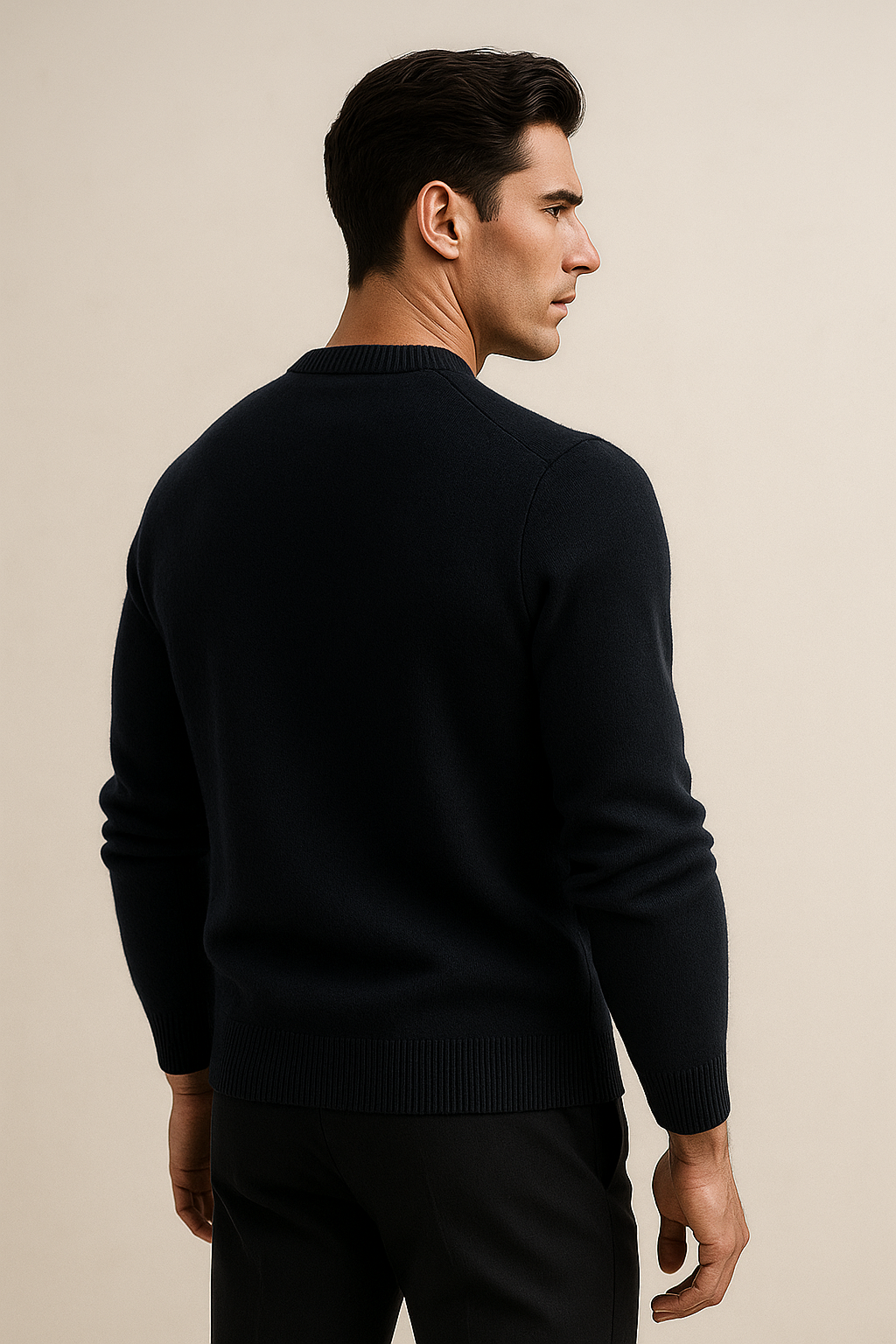 Emiral Couture navy cashmere knit sweater draped elegantly on a model, showcasing its soft texture and classic fit.
