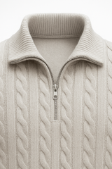 Emiral Couture grey cable knit sweater made from soft merino wool, featuring a cozy design and textured pattern.