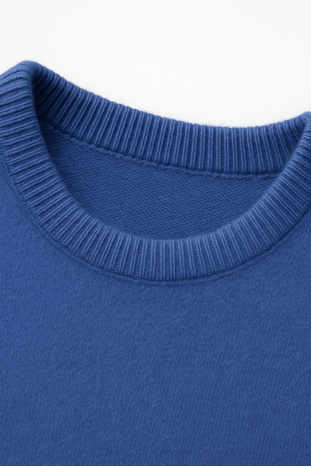 Emiral Couture luxury cashmere sweater in blue, featuring a cozy knit design and elegant silhouette.