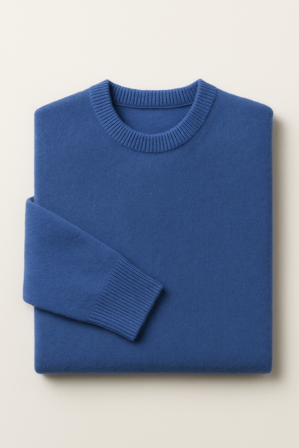 Emiral Couture blue cashmere knit sweater with a luxurious, soft texture and elegant design.
