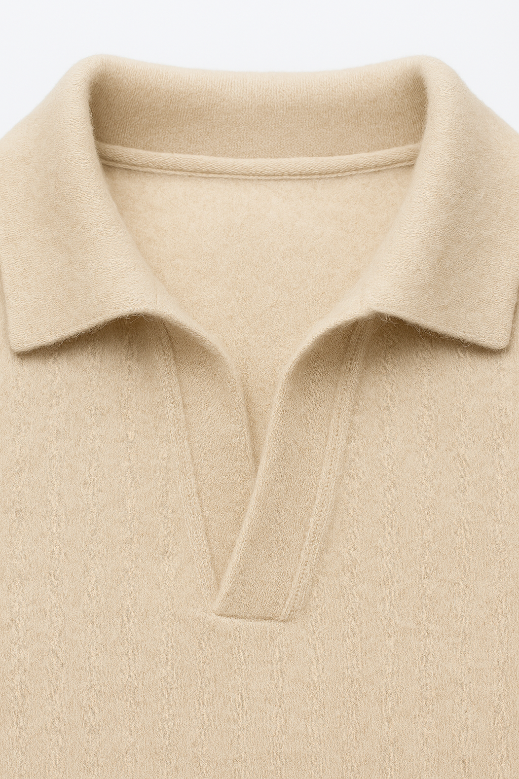 Emiral Couture oatmeal cashmere polo knit sweater with a soft texture and classic collar design.