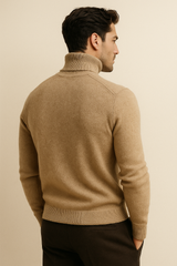 Dark beige Emiral Couture cashmere turtleneck sweater draped elegantly on a neutral background.
