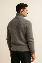 Luxurious grey cashmere turtleneck sweater by Emiral Couture, featuring a soft texture and elegant design.