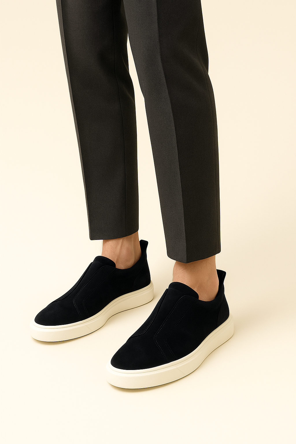Navy suede slip-on sneakers by Emiral Couture with a sleek, minimalist design and comfortable fit.