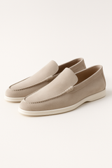 Beige Emiral Couture suede loafers with a sleek design and comfortable fit, perfect for stylish casual wear.