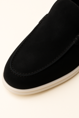 Black suede loafers by Emiral Couture featuring a sleek design and comfortable fit, perfect for casual or formal wear.
