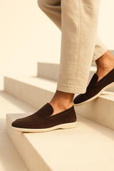 Brown suede loafers by Emiral Couture with a sleek design and comfortable fit, perfect for casual or formal wear.