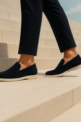 Navy suede loafers by Emiral Couture, featuring a sleek design and comfortable fit, perfect for casual wear.
