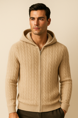 Beige cable knit hoodie with a hood from Emiral Couture, showcasing intricate knit patterns and a cozy design.