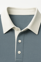 Cyan Emiral Couture polo knit sweater with a premium gabardine finish, featuring a classic collar and short sleeves.