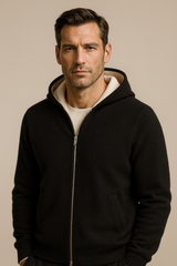 Reversible cashmere hoodie in gray by Emiral Couture, featuring a zip front and cozy hood for stylish warmth.