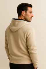 Emiral Couture cashmere hoodie with a zip and hood, featuring a stylish knit texture in a relaxed fit.