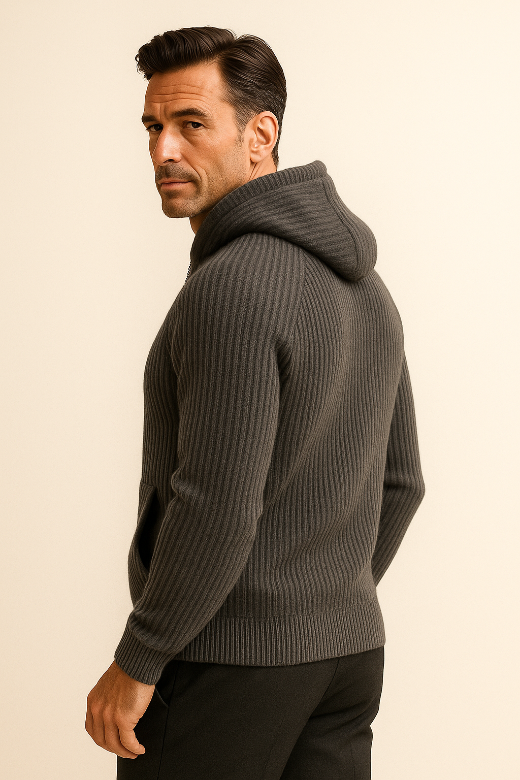 Dark grey hooded knit cardigan by Emiral Couture with ribbed texture and relaxed fit.