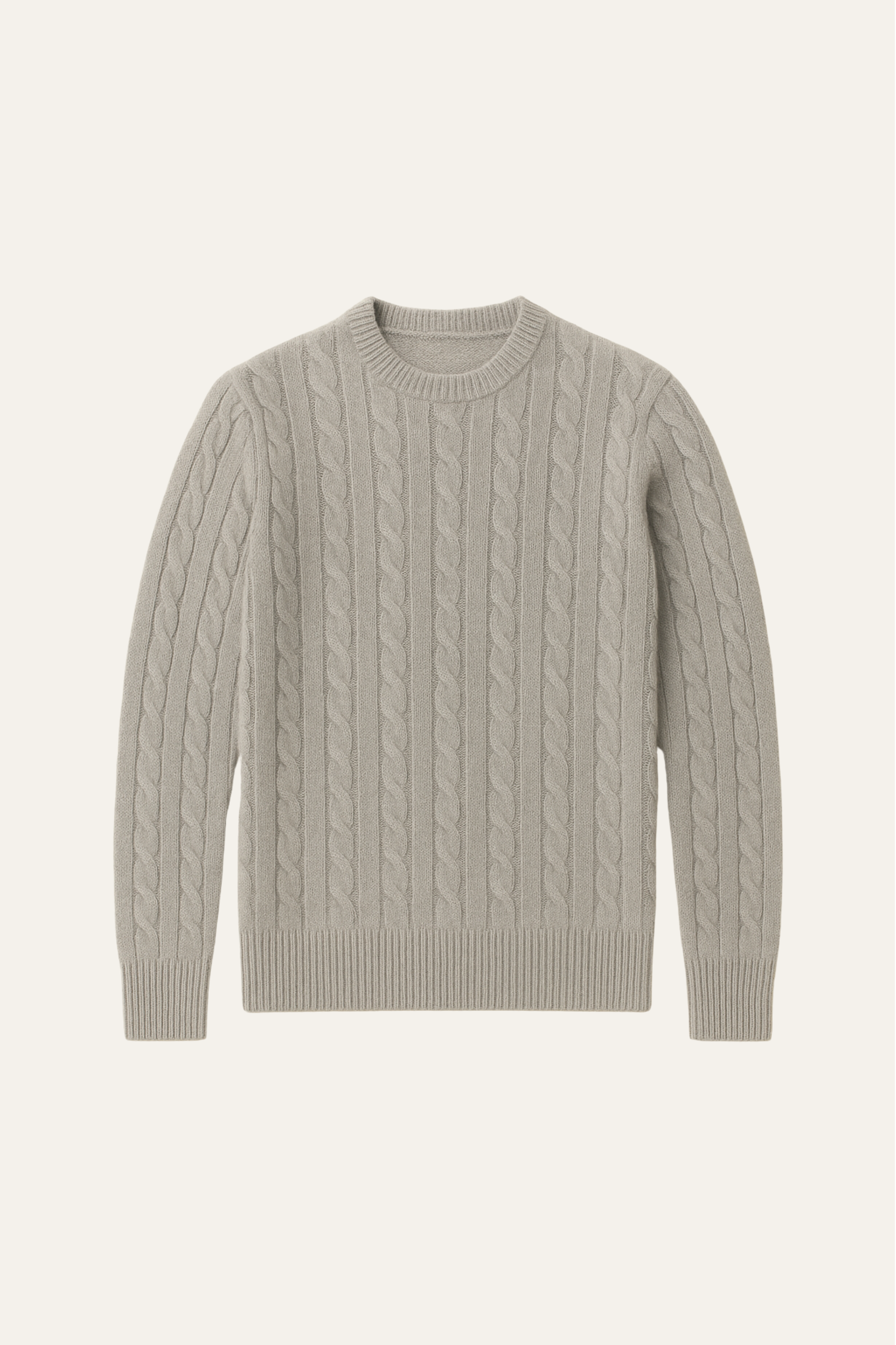Soft grey cashmere knit sweater by Emiral Couture, featuring a relaxed fit and elegant ribbed detailing.