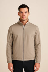 Taupe Reverso Bomber Jacket by Emiral Couture with a sleek design and ribbed cuffs, perfect for a stylish outfit.