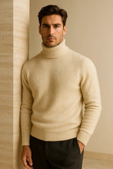 Emiral Couture ivory cashmere turtleneck sweater draping elegantly on a mannequin with a soft, luxurious texture.